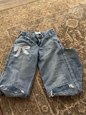 abercrombie kids Light Blue Distressed Jeans with Bow Patch
